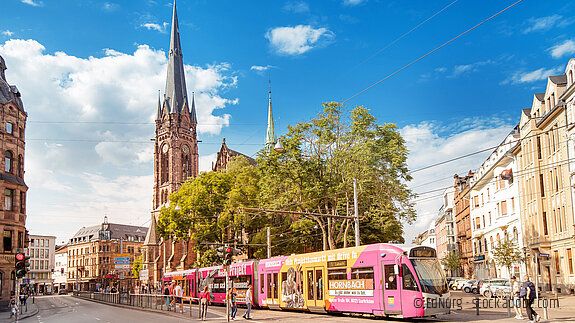 02 August 2019, Saarbrucken, Germany: Tram public transportation at the city street Eine Straßenbahn der Saarbahn in der Innenstadt von Saarbrücken